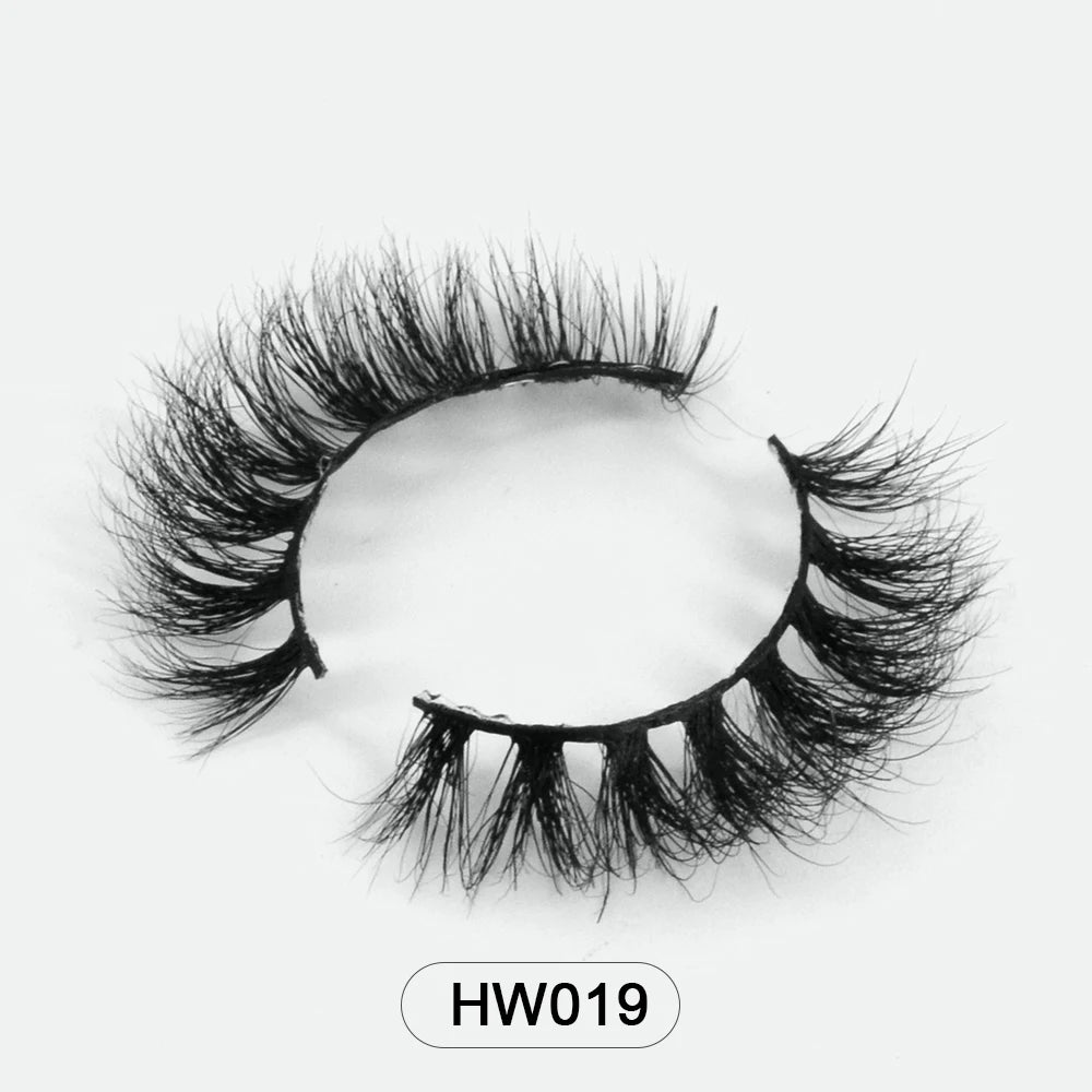 Pair of fluffy, wispy black 3D mink false eyelashes with a flexible band, labeled HW019 on a white background.