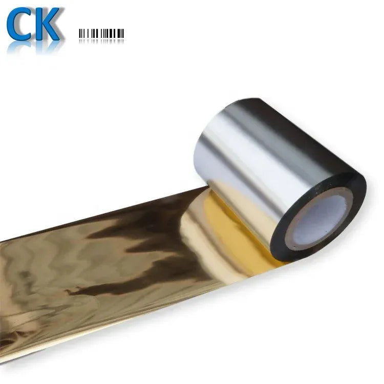 Gold wax ribbon with silver core, partially unrolled for thermal transfer printing
