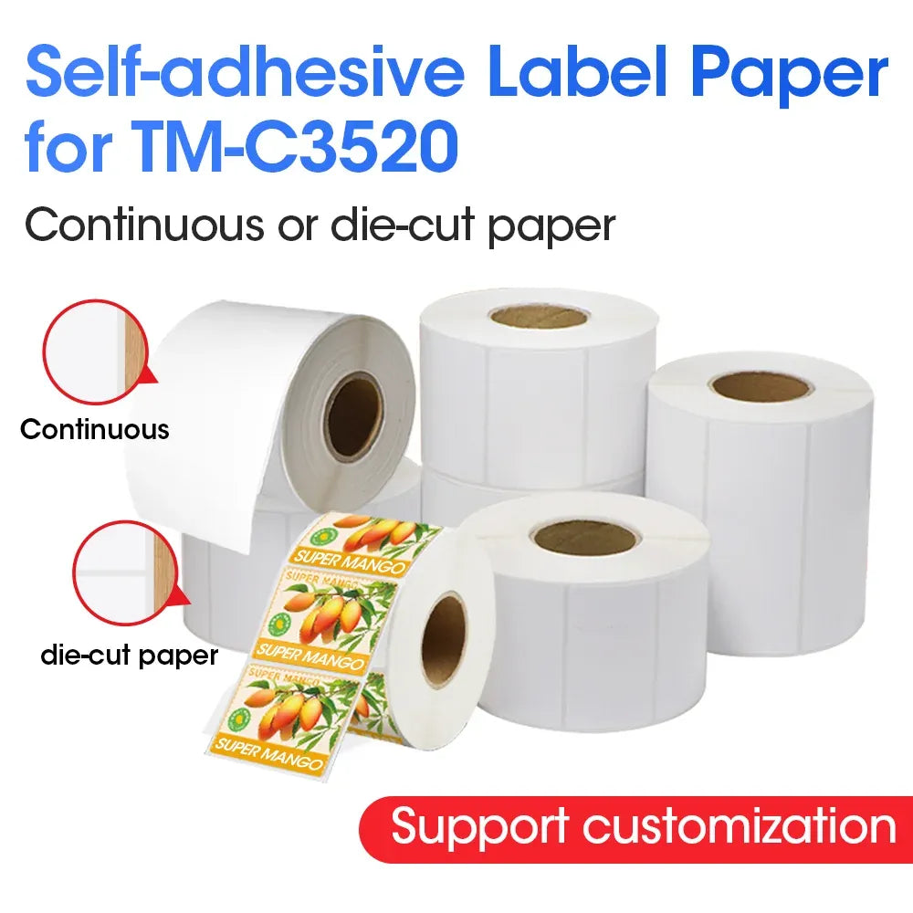 White self-adhesive label paper rolls with loose label strips, dispensing cores visible