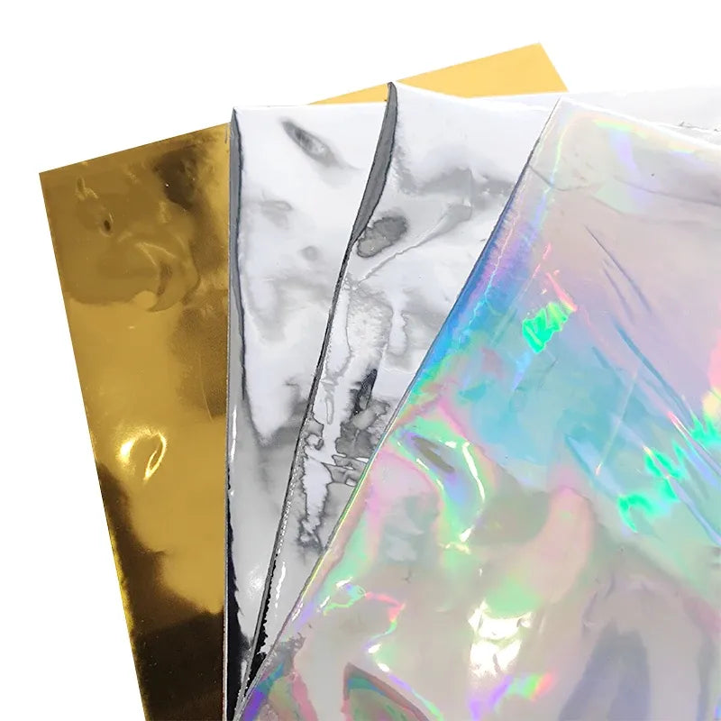 Metallic reflective film pieces, gold side, silver mirror, and iridescent rainbow sheen