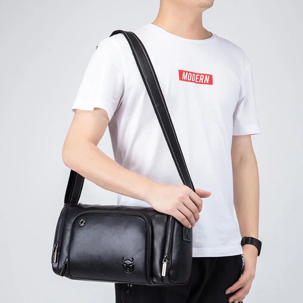 BULLCAPTAIN black cowhide leather trunk messenger bag with zip compartments and adjustable shoulder strap for men.