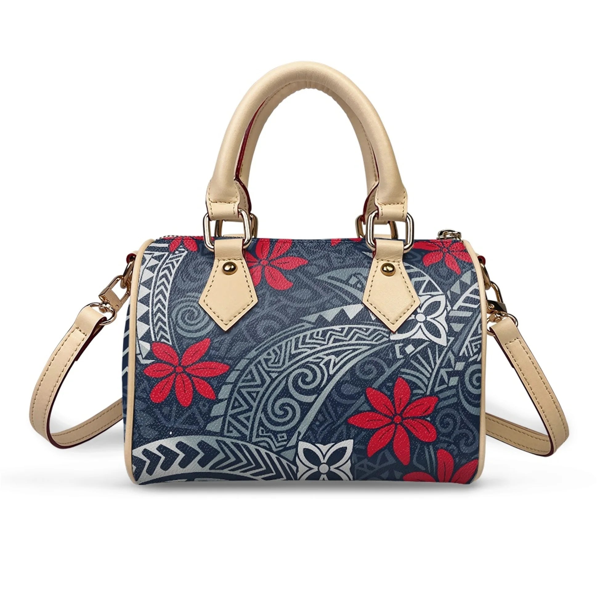 Pillow-shaped handbag with blue and red tribal floral print, beige leather handles, and detachable crossbody strap.