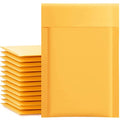Yellow paper padded mailer envelope with flap closure, front view over stacked packs