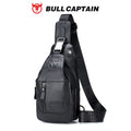 Black genuine leather Bullcaptain sling bag for men with branded shoulder strap, metal buckle, and front zip pocket.
