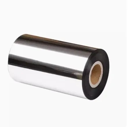 Silver thermal transfer ribbon roll with black outer edge and visible cardboard core