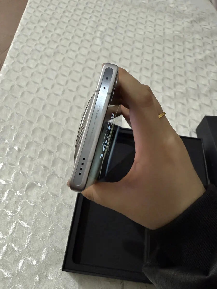 Close-up of the Vivo X100 Ultra 5G camera module, metallic side frame, volume buttons, and USB-C charging port.