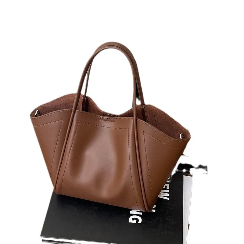 2025 Autumn Winter High-End Niche Genuine Leather Wing Bag Large Capacity Commuter Shoulder Promotional Drawstring Sportpacks