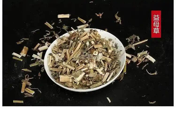 Dried motherwort herbal bath bag ingredients in a white bowl for foot soak spa and traditional Chinese medicine care.