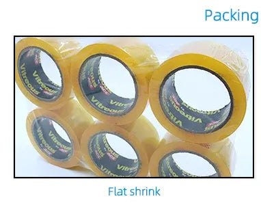 Multiple yellow tape rolls arranged for packing, each with printed core branding