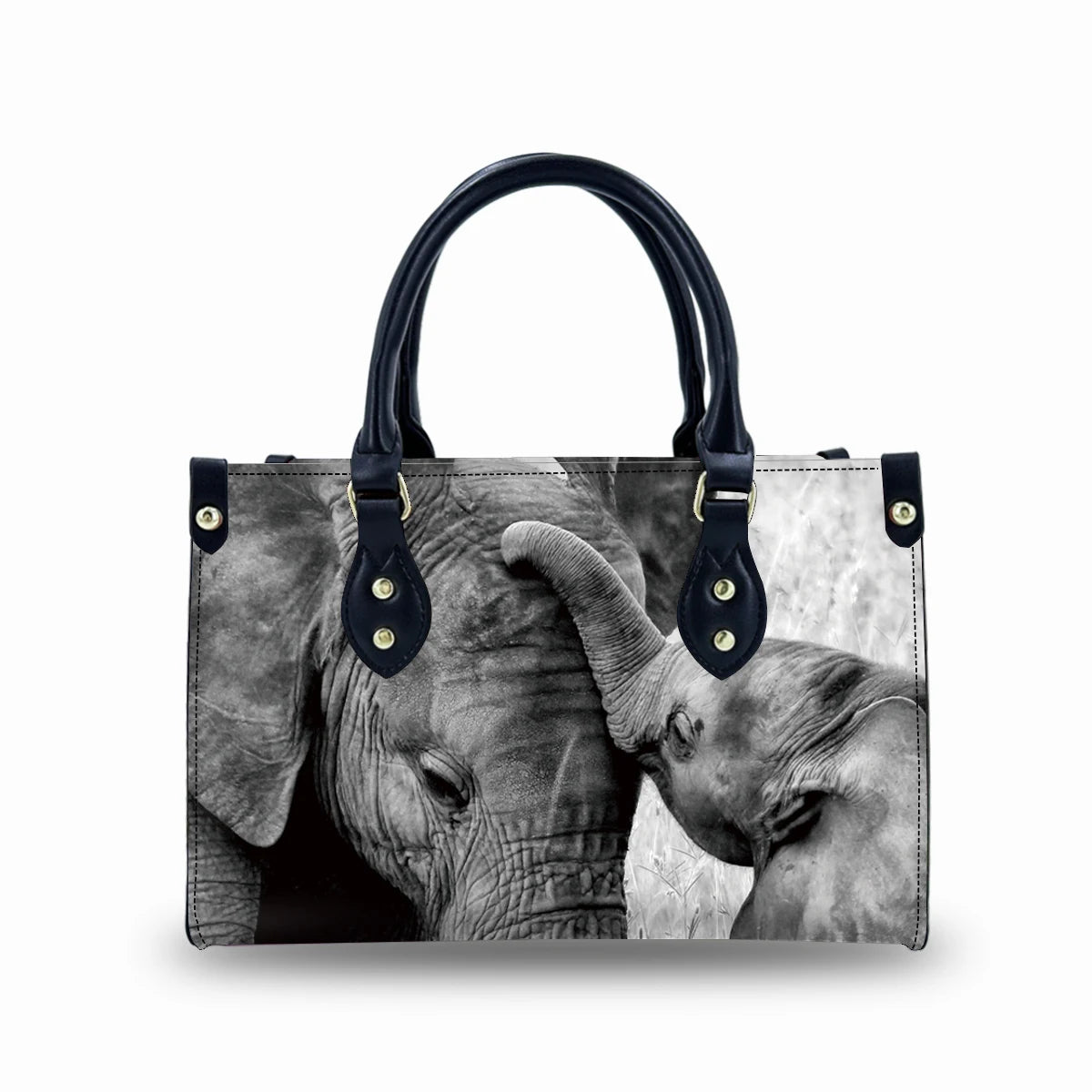 Genuine leather trunk handbag featuring a black and white elephant trunk print, black top handles, and buckle details.