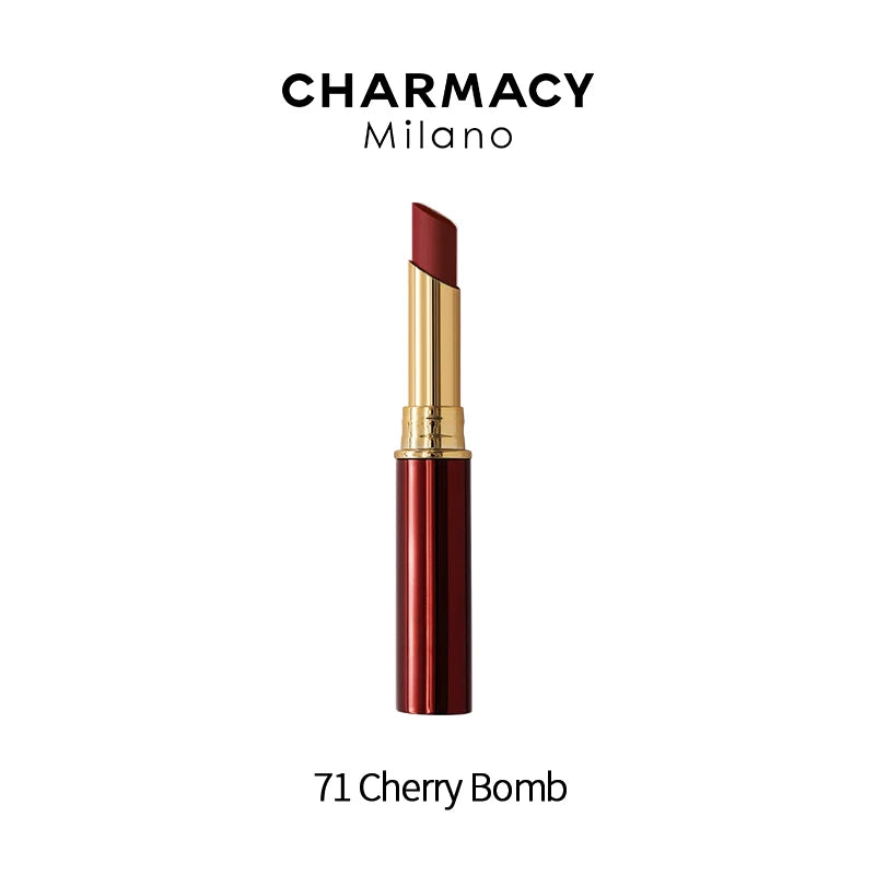 Charmacy Cherry Bomb velvet matte lipstick in a slim, elegant gold and red tube for long-lasting lip makeup.