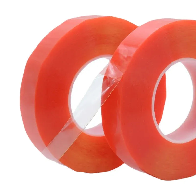 Two red double-sided polyester tape rolls shown side-by-side with inner cores