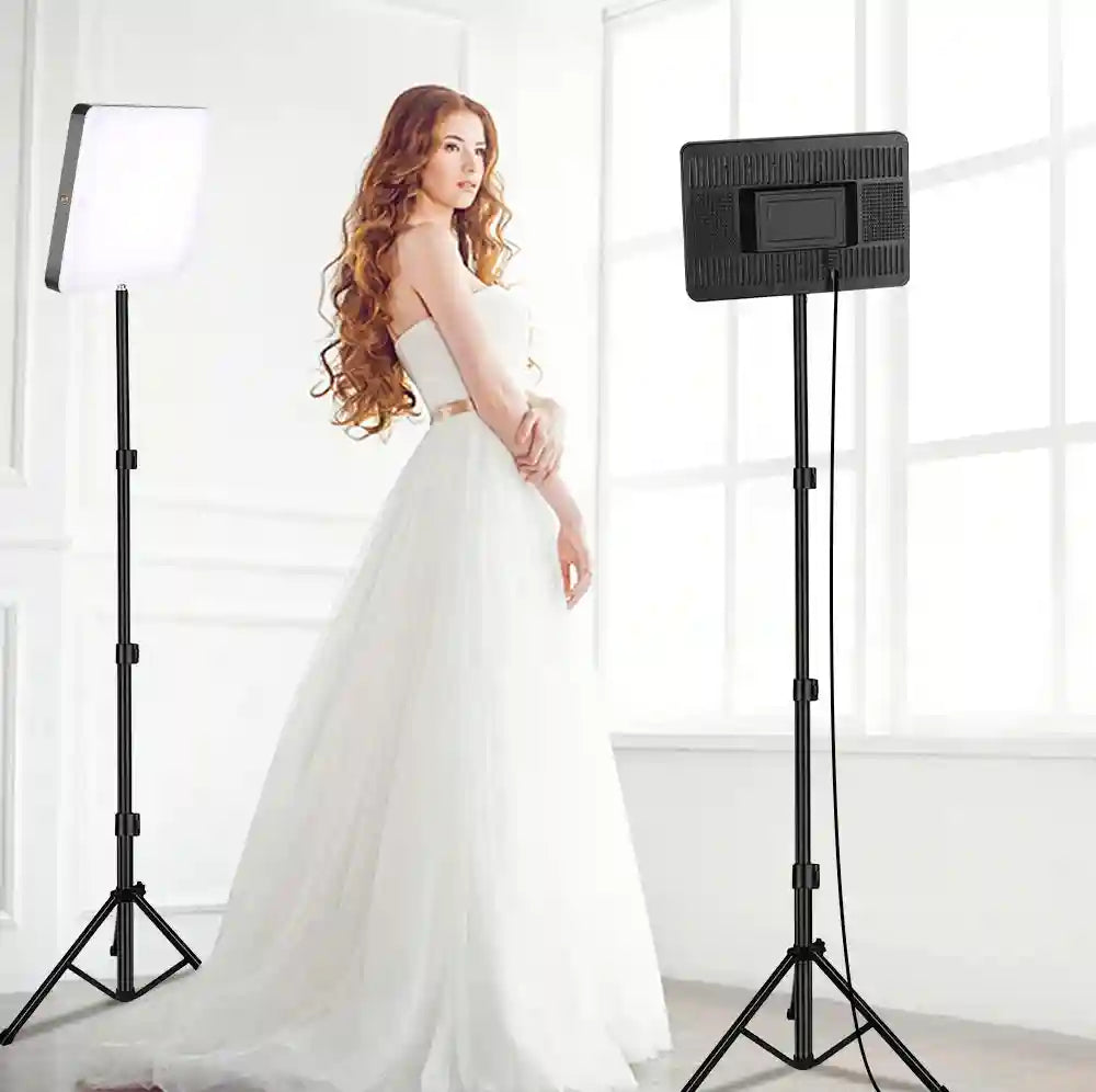 Rectangular LED panel lights on adjustable black tripod stands for photography and video lighting.