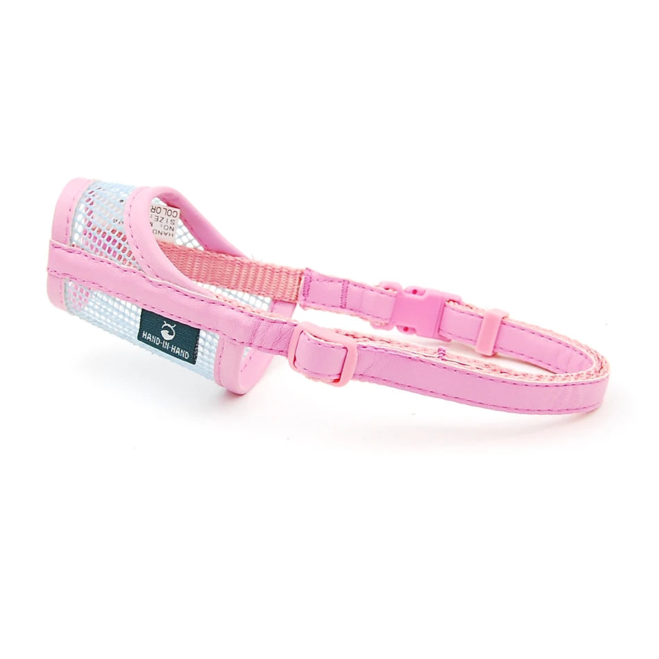 Pink breathable mesh and leatherette dog muzzle for small to large dogs, designed for safe and comfortable training.