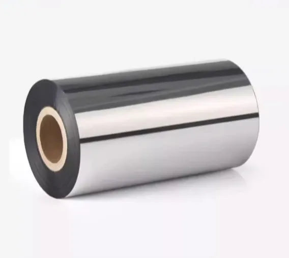 Silver and black thermal transfer ribbon roll with exposed core and flat surface