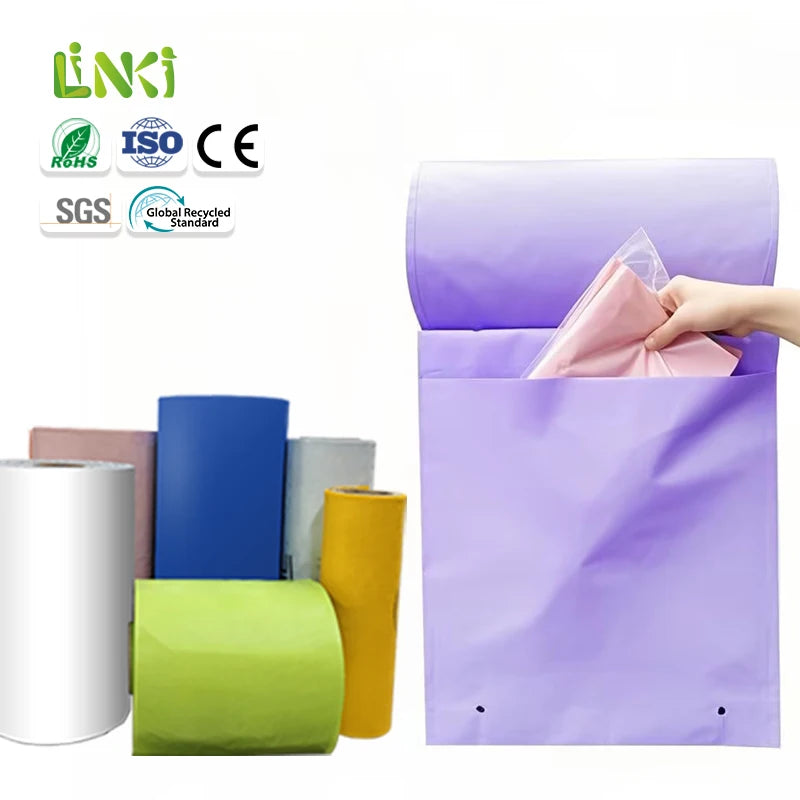 Pre-opened perforated plastic poly bag roll, purple with mixed colored bag rolls