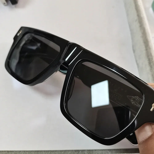Luxury black square acetate sunglasses with dark grey lenses. Premium handcrafted eyewear frame.