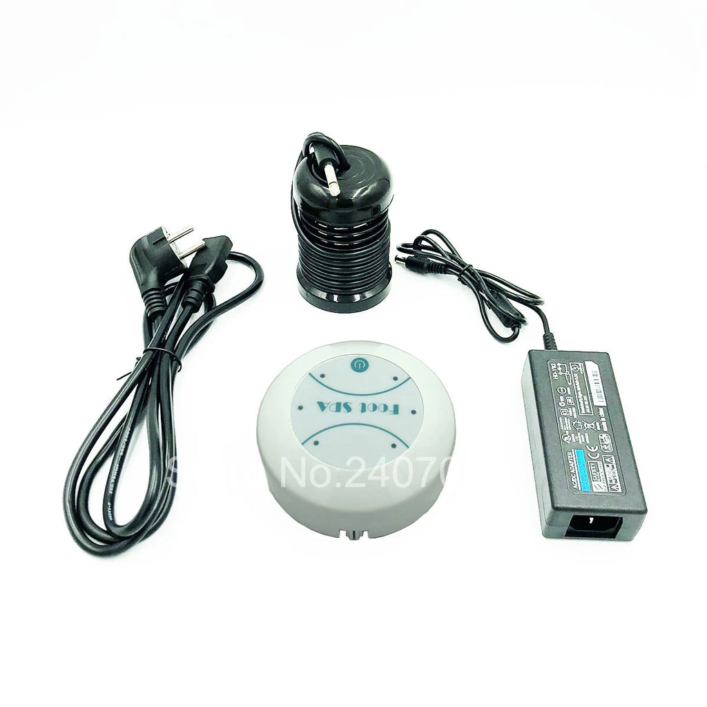 Electric ionic foot spa detox machine with round controller, black ion array, and power adapter on white background.