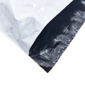 Black plastic shipping bag, glossy finish, with black heat-seal strip