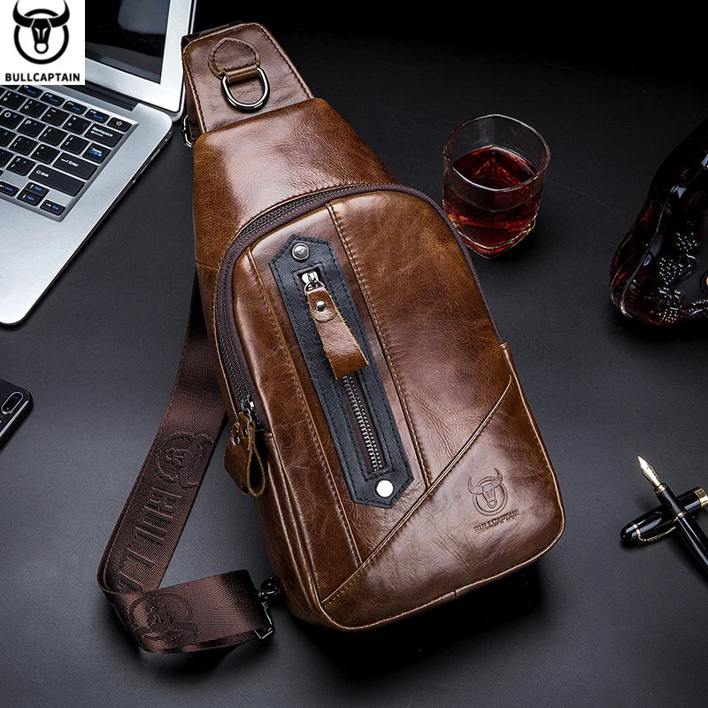 BULLCAPTAIN brown leather chest bag for men. Casual sling messenger with multi-function zip pockets and logo.
