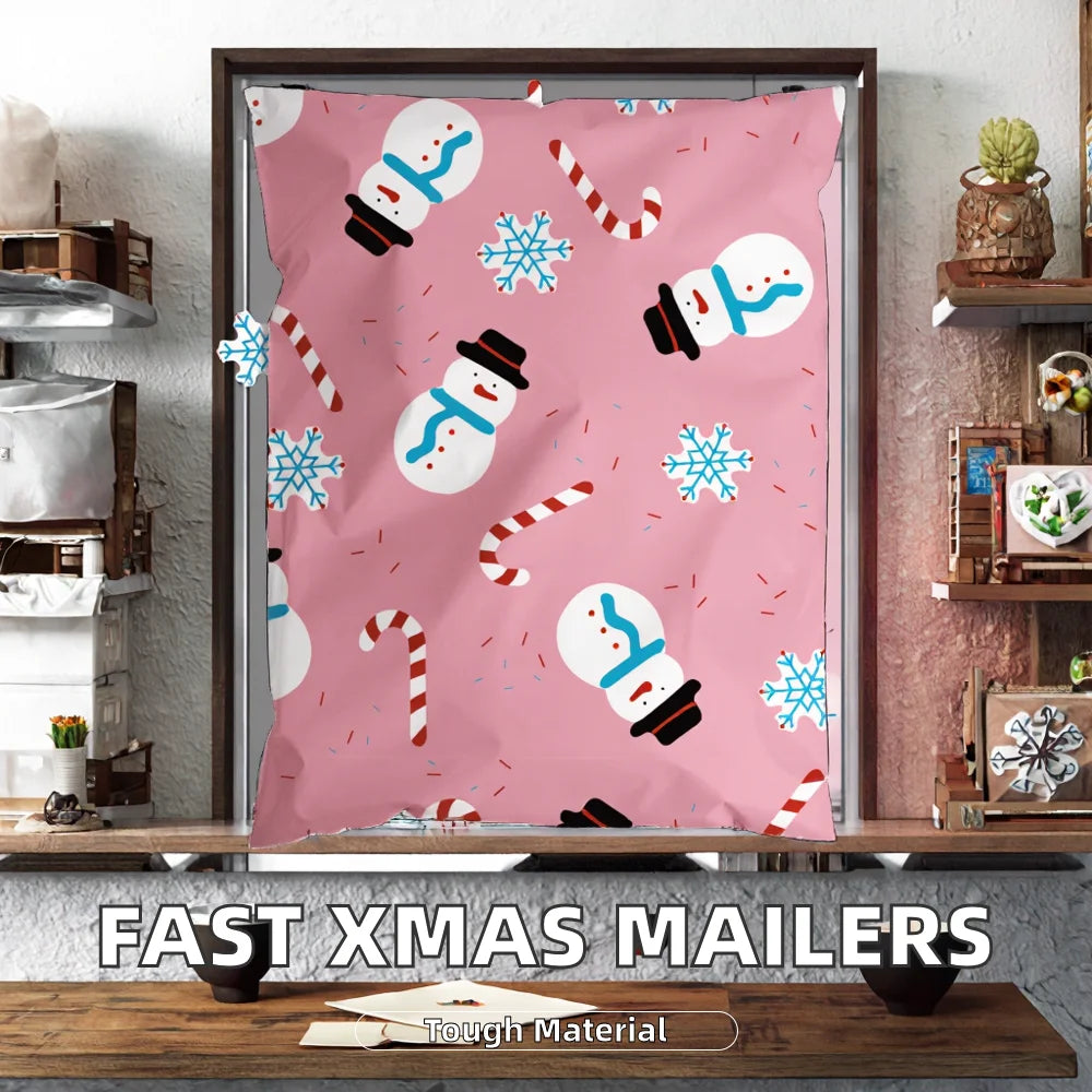 Pink waterproof poly mailer hanging on frame, snowman and candy-cane print