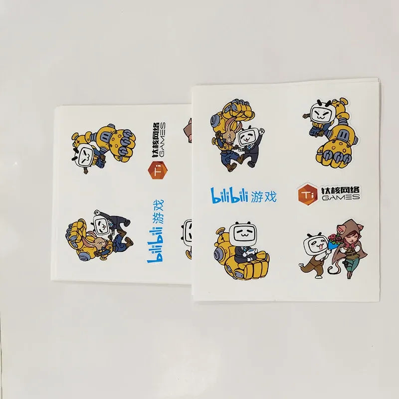 Waterproof sticker sheet pair featuring colorful cartoon characters and game-style logos