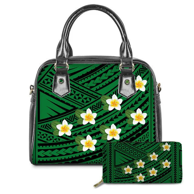 Green leather tribal handbag and matching wallet set featuring an American Samoa Polynesian plumeria floral print.