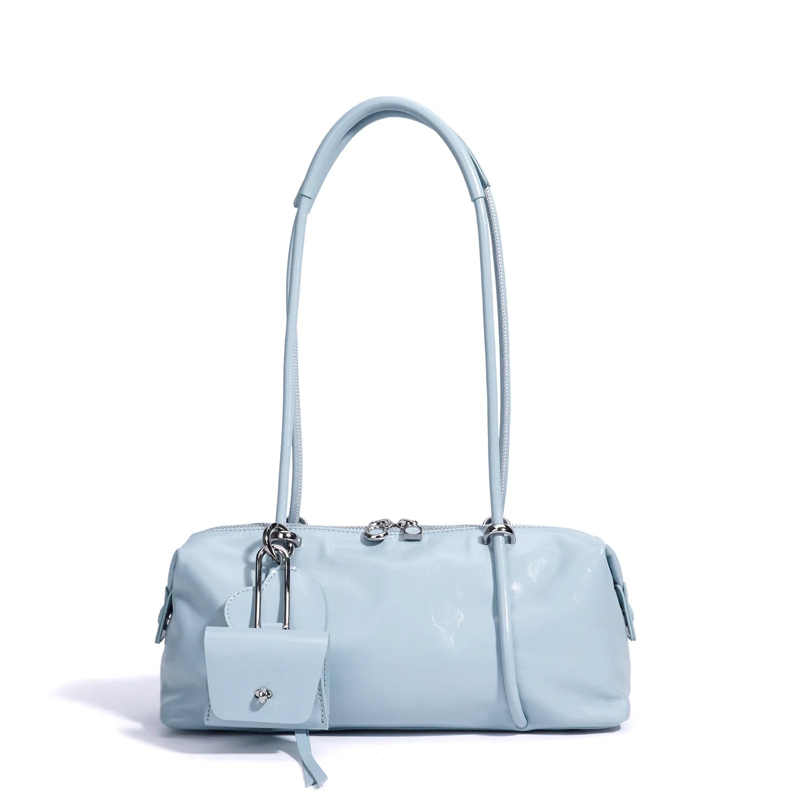 Light blue leather Boston underarm bag, minimalist pillow shape, zipper closure, and matching hanging charm accessory.