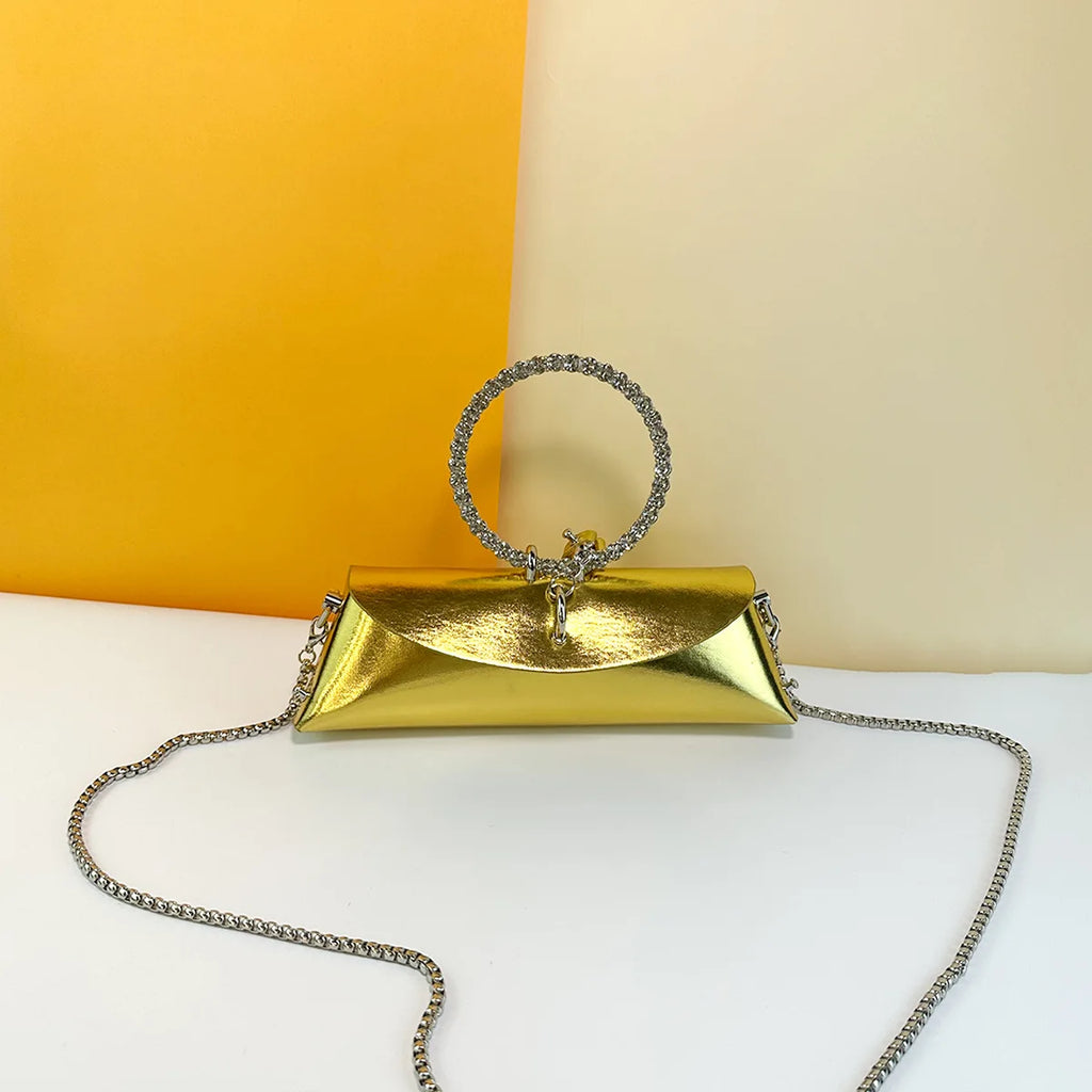 Gold metallic PU evening clutch, wedding handbag with crystal ring handle and detachable silver chain strap.