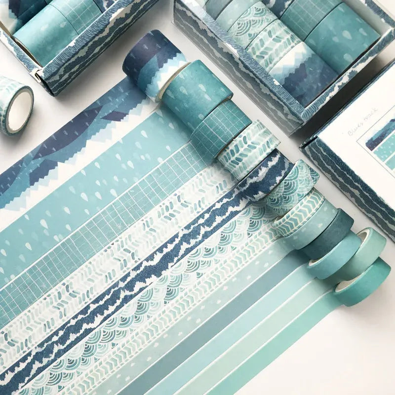 Washi tape set with teal and blue geometric patterns, including grid and wavy stripes