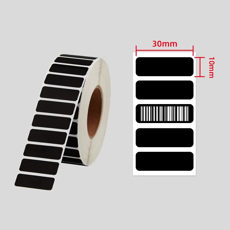 Black adhesive label roll with 30mm x 10mm label size, white backing