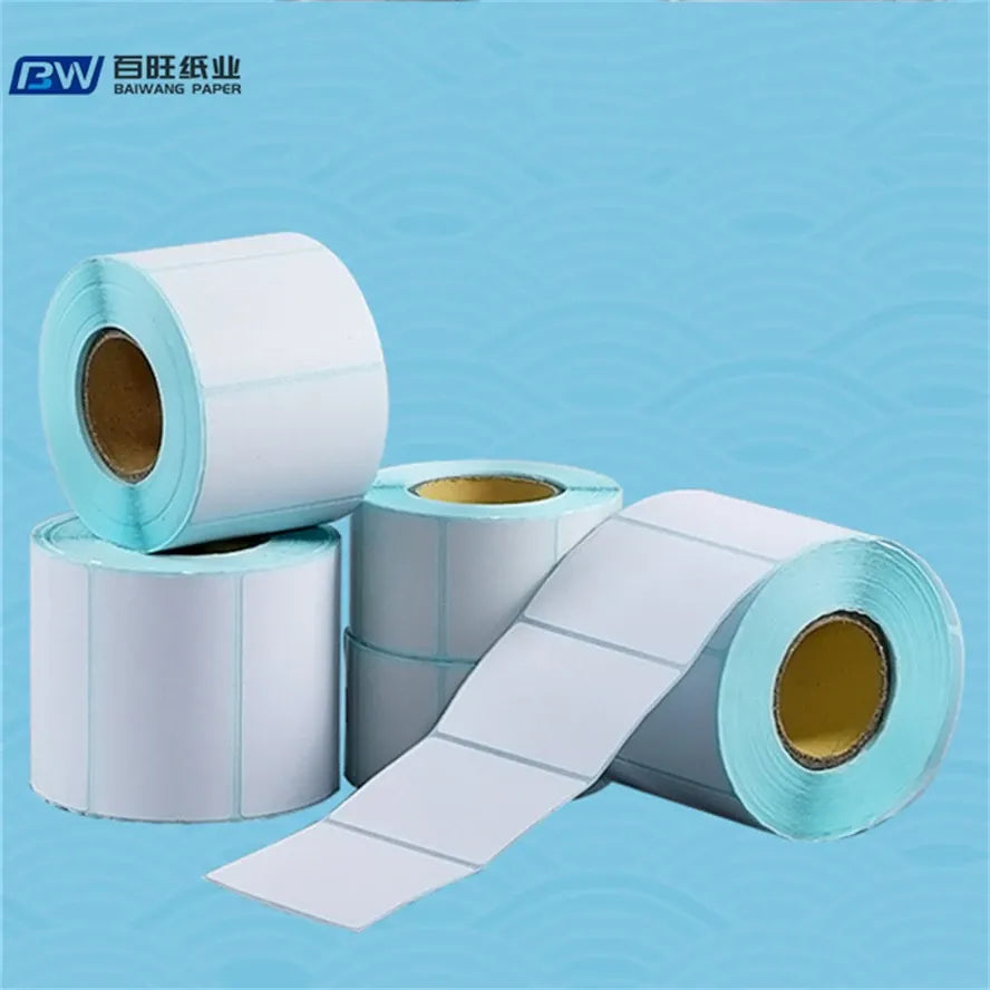 Thermal label roll paper with loose label sheets and stacked rolls, light blue edges