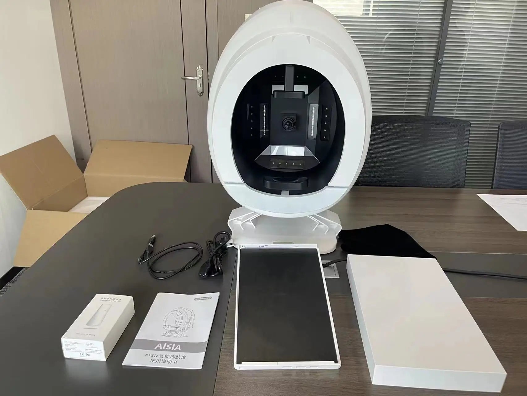 White smart facial skin analysis machine with camera, tablet, and manual for professional skin and anti-aging scanning.