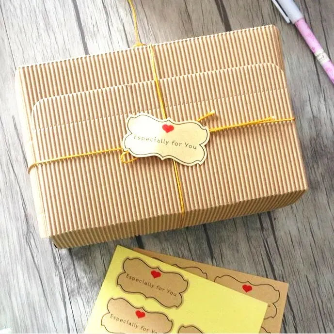 Kraft gift box with striped wrapping and flower-shaped Especially for You label sticker