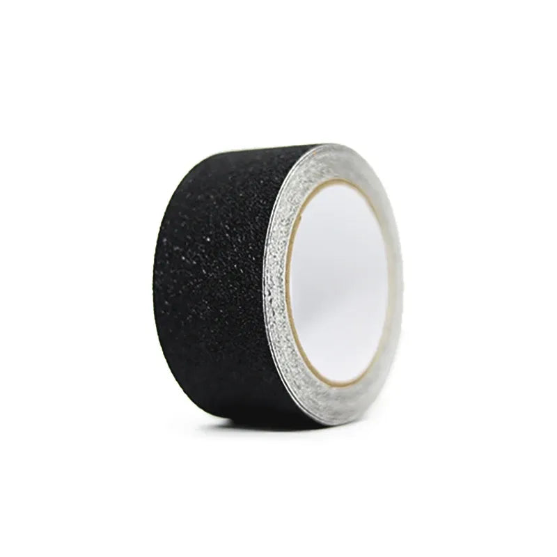 Black anti-slip grip tape roll with textured top and adhesive core