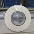 White PE shrink wrap repair tape roll with clear inner core, 4-inch width