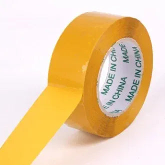 Yellow masking-style tape roll with visible label on underside, 76mm width