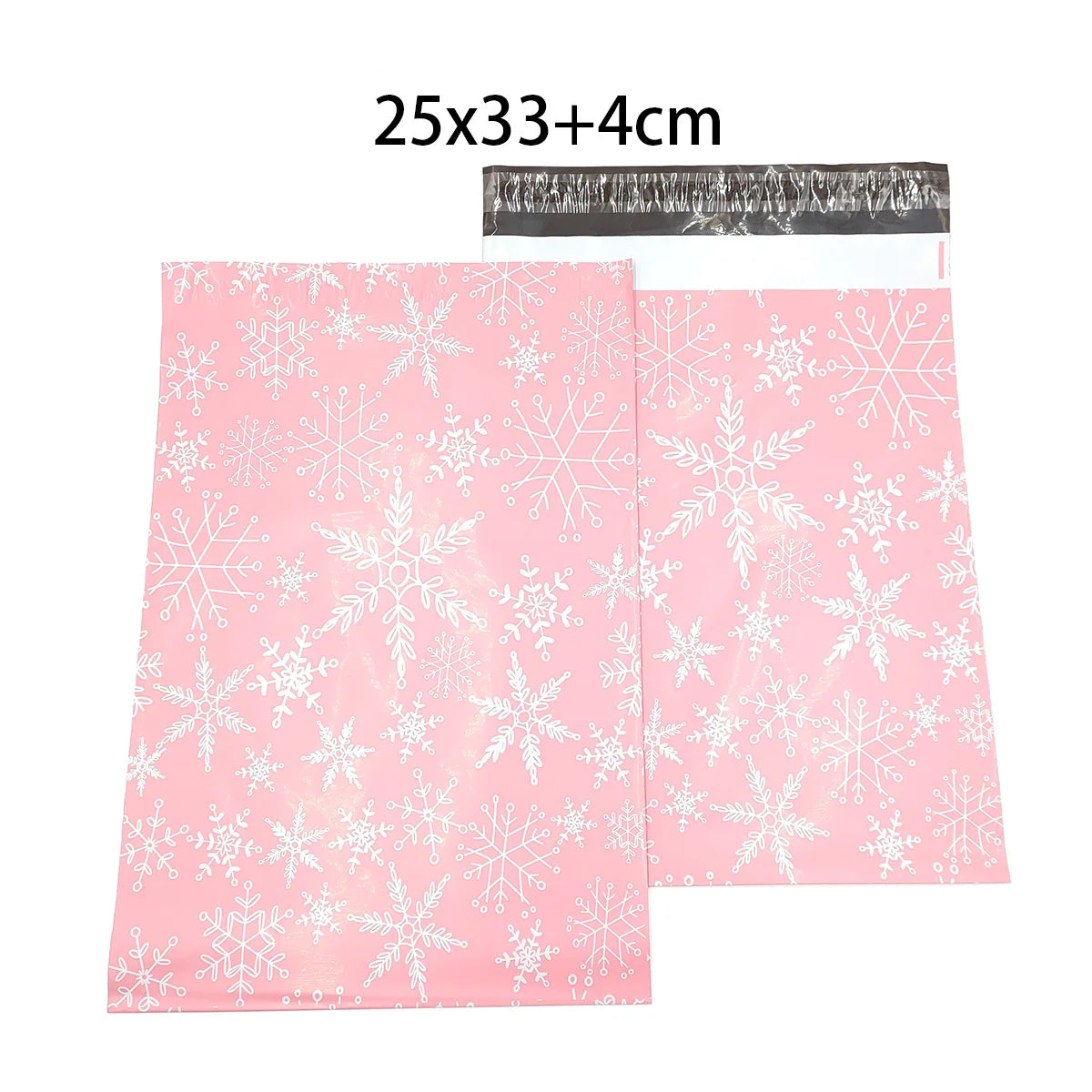 Pink poly mailer with white snowflake pattern, size text at top