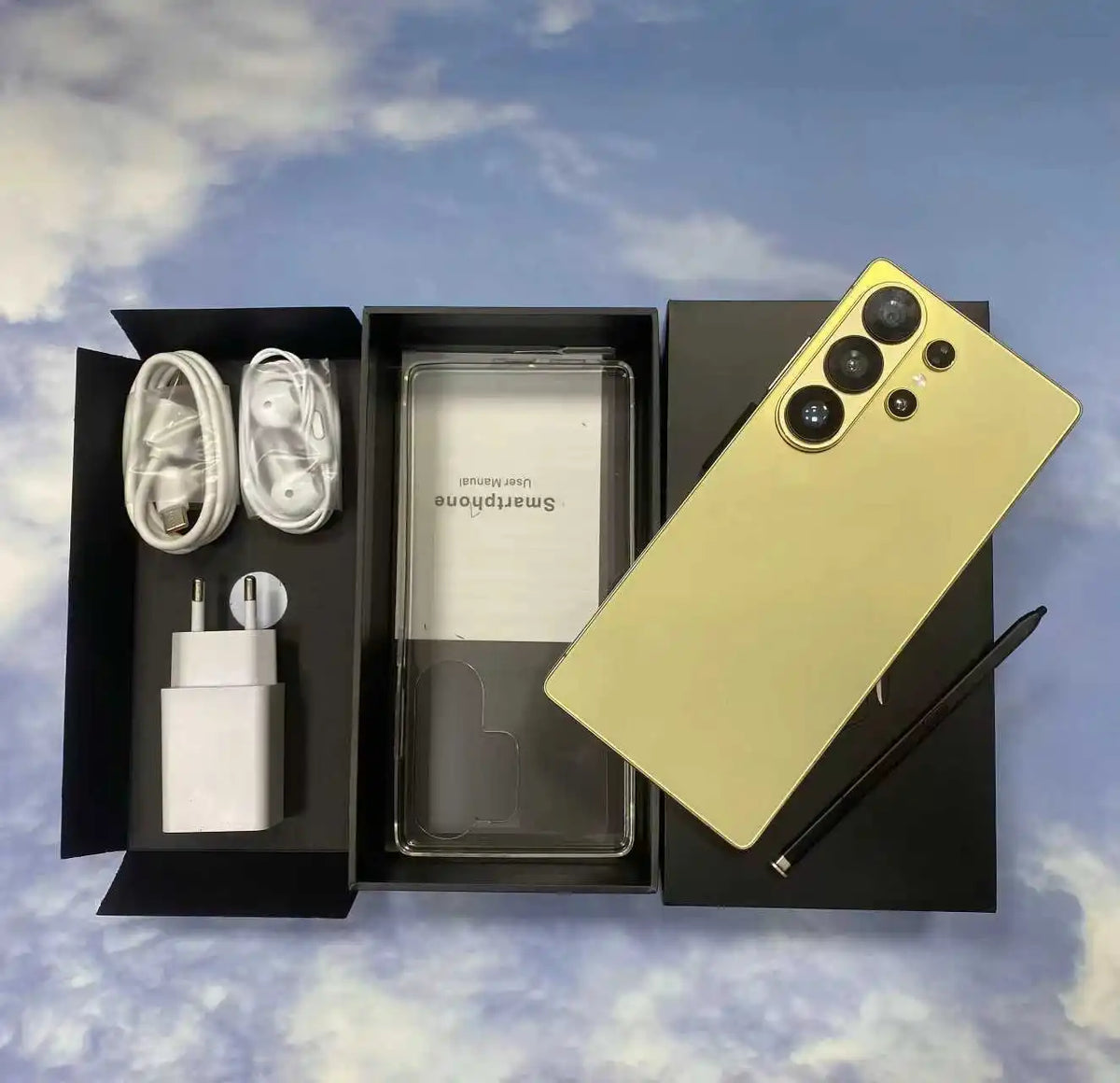 Yellow smartphone bundle with box contents: phone, charging cable, earbuds, and SIM tool.