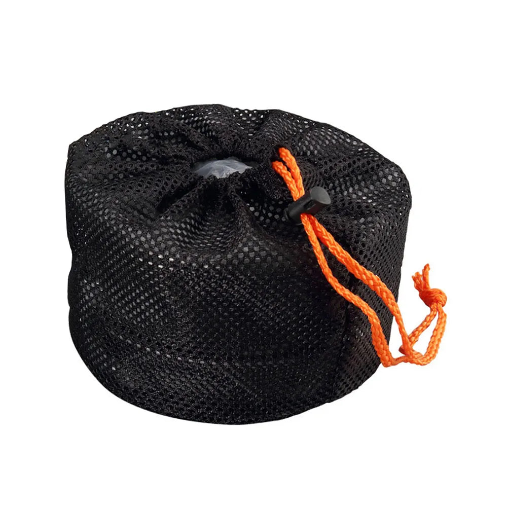 Black fabric camping cookware storage bag with orange drawstring cord