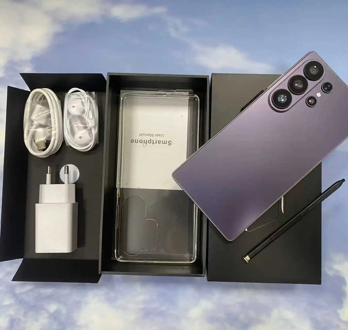 Purple smartphone with rear multi-camera array and pen-style accessory in box