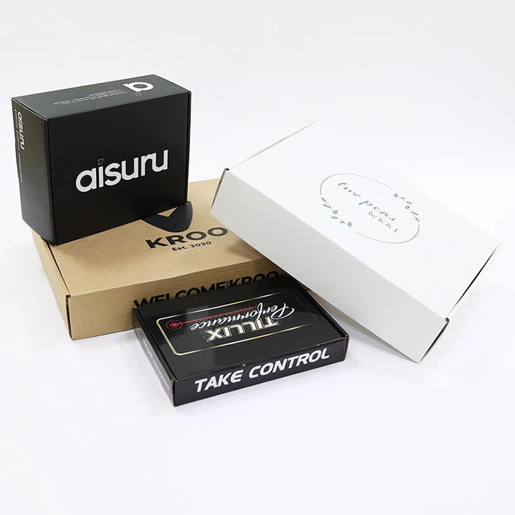 Printed shipping boxes in brown and white with visible logo labels and lids