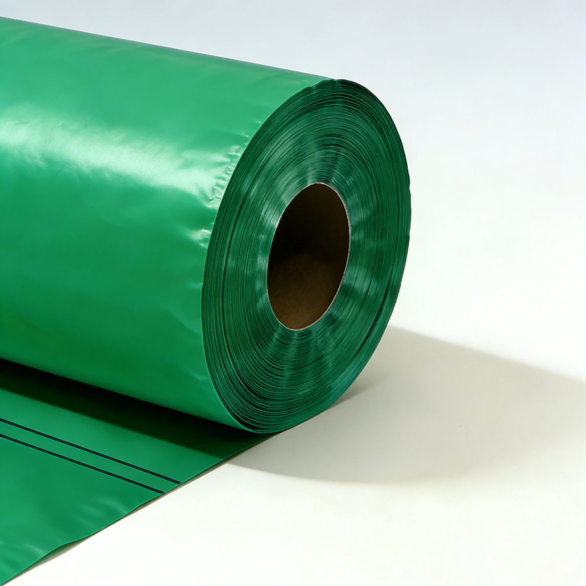 Pre-opened automatic roll bag roll with center hole and folded green sheet