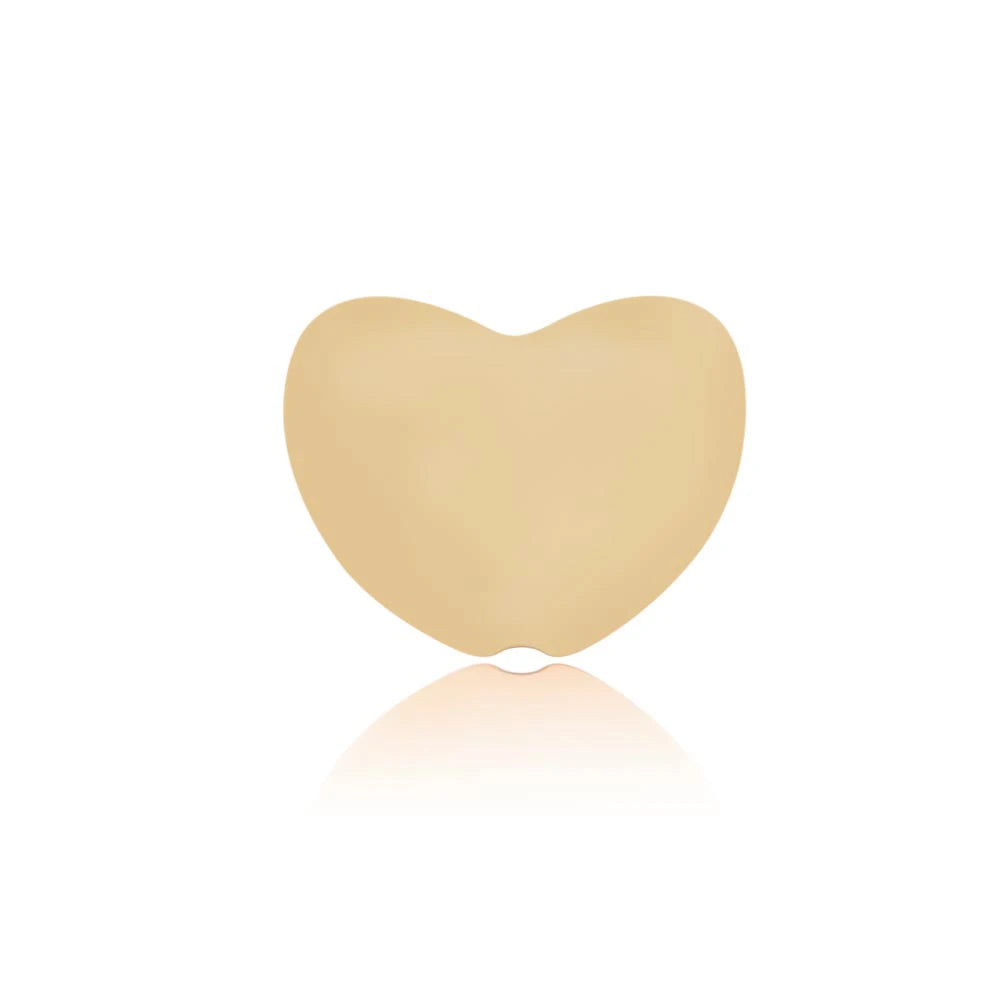 Beige heart-shaped silicone baby teething toy for soothing infant gums.