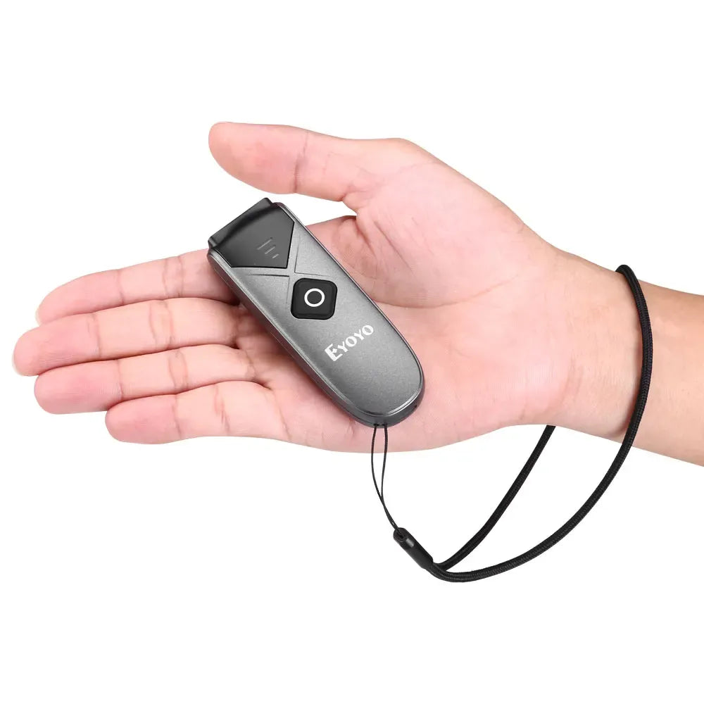 Eyoyo handheld barcode scanner in hand with connected black cable