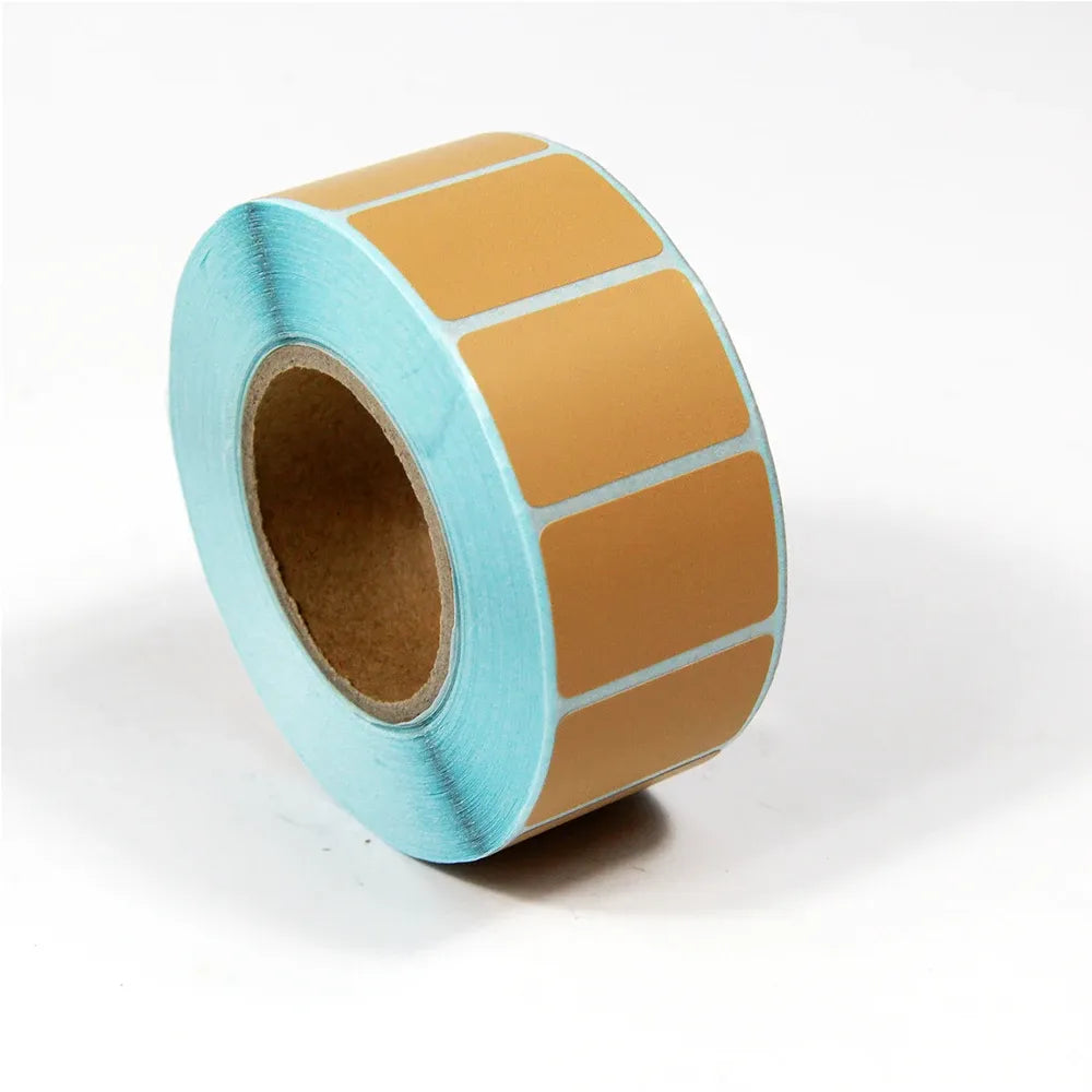 Light blue-backed label roll with tan rectangular label squares