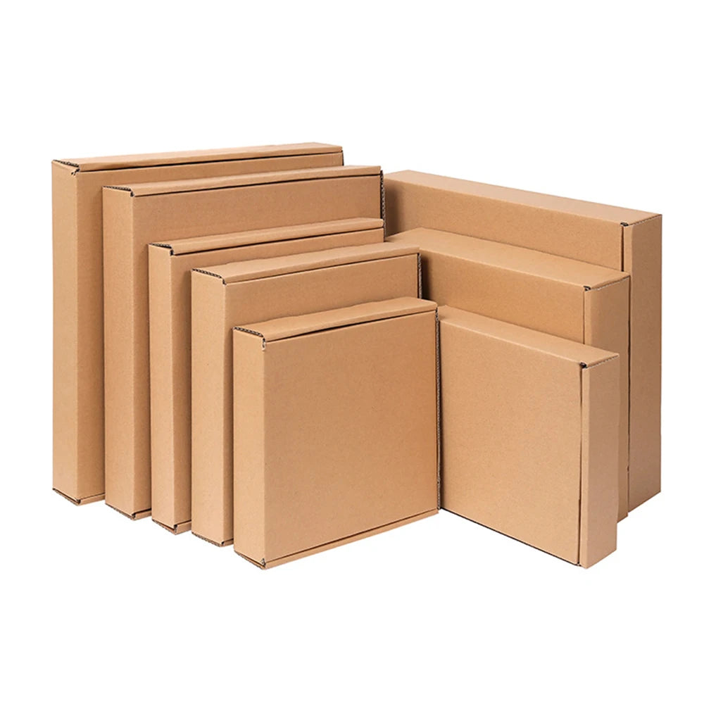 Stack of brown kraft paper shipping boxes with folded flaps and corners
