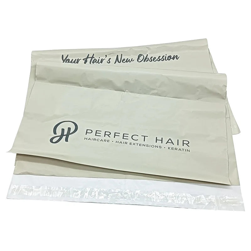 White padded poly mailer bag with printed logo text and bubble padding edge