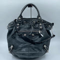 Luxury Pre-Owned Designer Leather Bucket Bag with Chic Metal Studs and Adjustable Shoulder Strap
