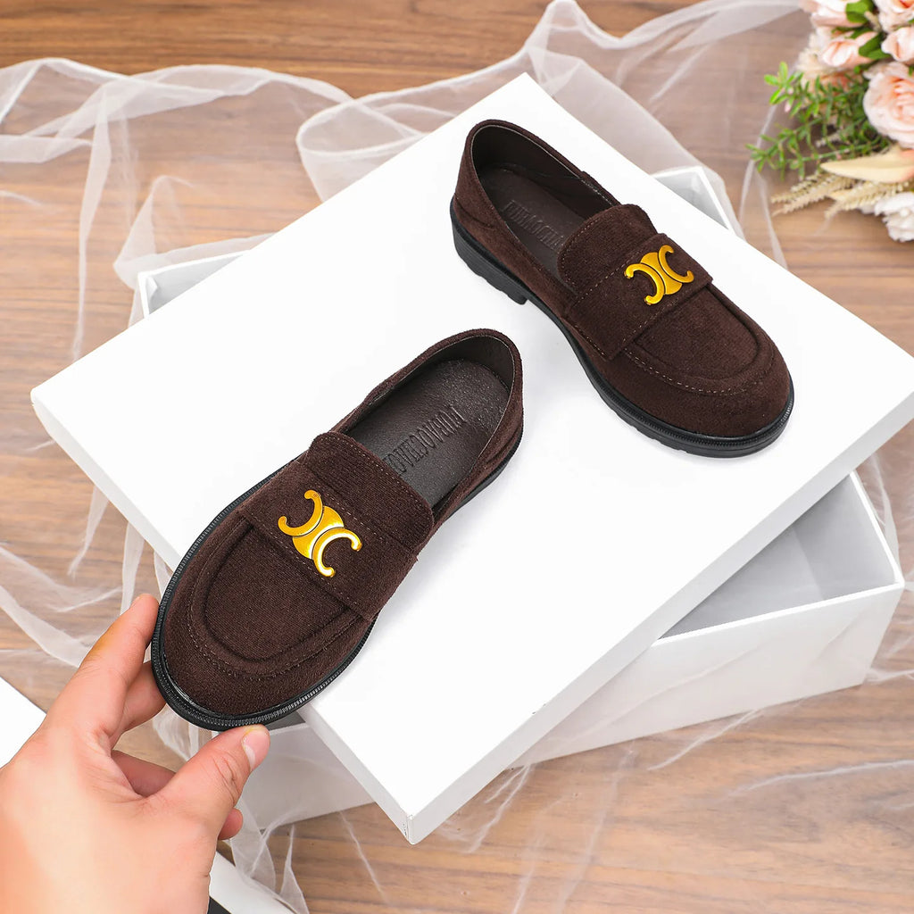 Luxury brown suede women's loafers with gold C-logo hardware, round toe, and durable black rubber lug sole.